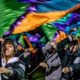 The halftime show included colorful flags. Photo by Kurt Stepnitz