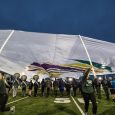 The color guard used flags during the performance. Photo by Kurt Stepnitz